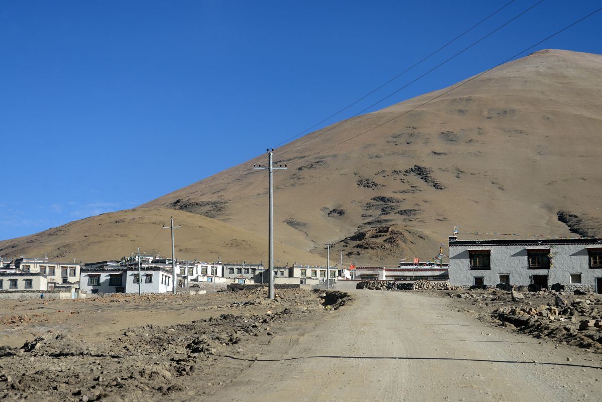 03 Passing Through A Tibetan Village On the Tingri Plain Driving From Tingri To Mount Everest North Base Camp In Tibet
